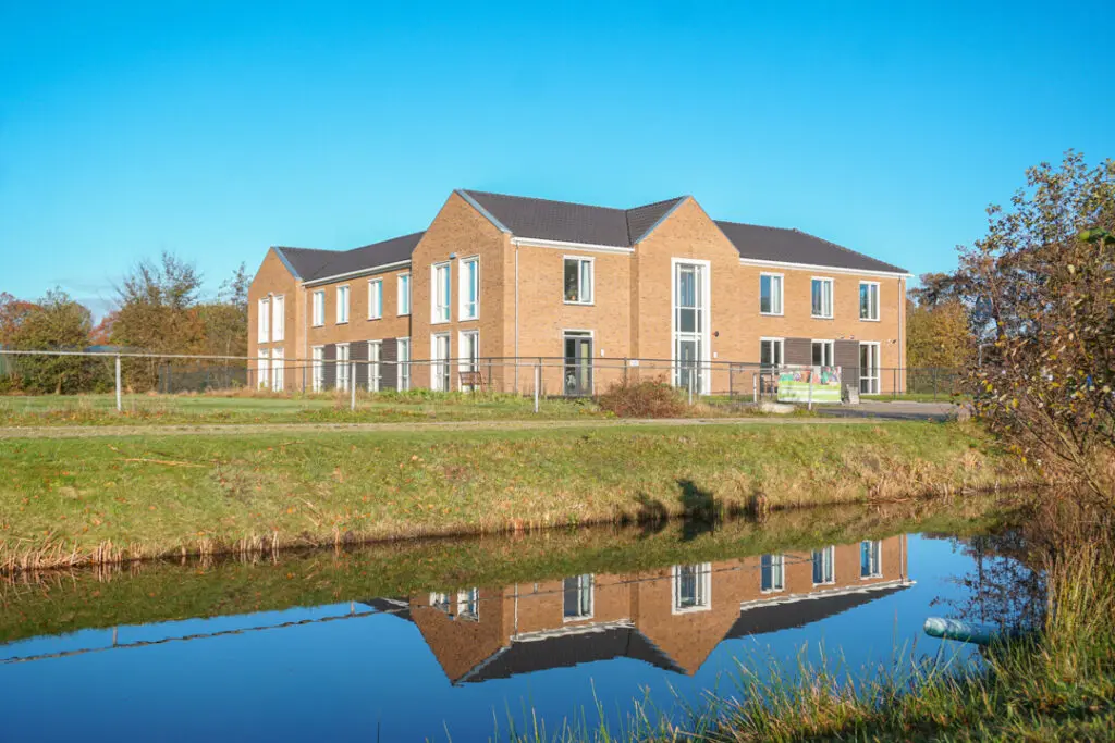 Een foto van Het Blaauwhofhuis van Dagelijks Leven waar mensen met dementie kleinschalig en betaalbaar wonen in een particuliere zorginstelling