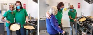 In de keuken van Het Venenhuis in Deventer bakken medewerkers pannenkoeken. Een bewoner komt even controleren.
